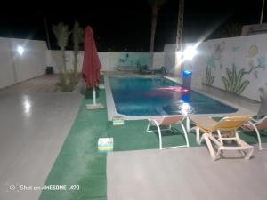 La alberca dentro o cerca de Villa Mahbouba face à la mer 5 fotos más