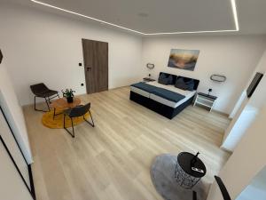 Ένα ή περισσότερα κρεβάτια σε δωμάτιο στο Apartmany ZAHRADNICKA