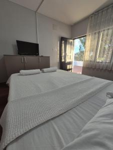 Ένα ή περισσότερα κρεβάτια σε δωμάτιο στο Anka butik otel camping