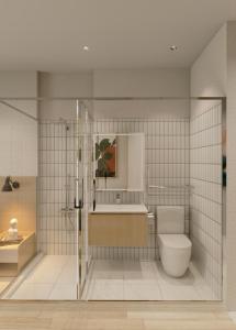 Et badeværelse på La Cheminee Boutique Apartment