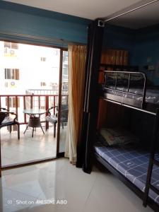 Кровать или кровати в номере Jomtien Beach Hostel & Guesthouse +31 фотография