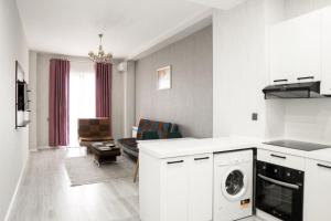 Kuchyň nebo kuchyňský kout v ubytování Hazz Palace Hotel