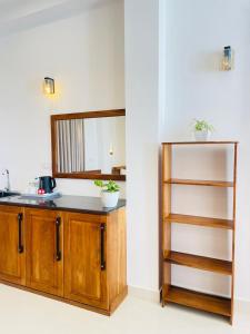 Η κουζίνα ή μικρή κουζίνα στο Crossing Royal +66 φωτογραφίες