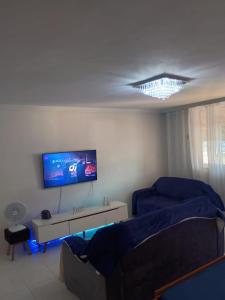 Et tv og/eller underholdning på Casa agradável no Rio de Janeiro - Ilha do Governador