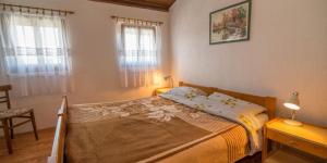 En eller flere senge i et værelse på House Jasna Punta Kriza