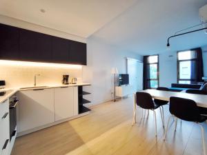 Kuchyň nebo kuchyňský kout v ubytování Apartamento céntrico, moderno, Terrassa Rambla