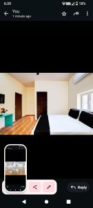 a picture of a bedroom with a bed and a cell phone at Hotel RR palace iyyapanthangal near Ramachandra hospital in Chennai