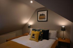 Ένα ή περισσότερα κρεβάτια σε δωμάτιο στο Gorgeous apartment in the heart of Sandwich