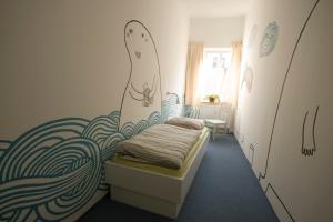 Voodi või voodid majutusasutuse Labyrinth Hostel Weimar toas