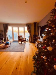 Posezení v ubytování Cotswolds Lakeside Lodge - Nesbitt's Nest