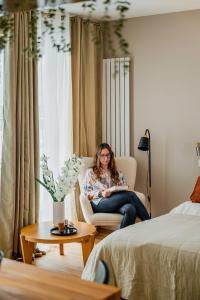 Ένα ή περισσότερα κρεβάτια σε δωμάτιο στο Zegrze Lake Apartament MORO z miejscem postojowym