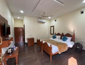 Μια τηλεόραση ή/και κέντρο ψυχαγωγίας στο The jungle retreat ranthambore +7 φωτογραφίες