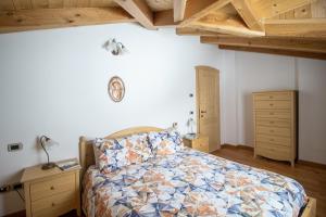 Ένα ή περισσότερα κρεβάτια σε δωμάτιο στο Cà Giulia