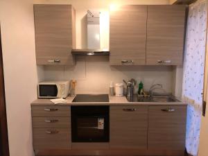 Køkken eller tekøkken på DaNicolas Novara Apartment + 25 billeder