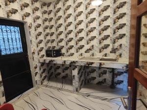 Η κουζίνα ή μικρή κουζίνα στο Résidence marie