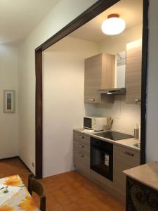 Køkken eller tekøkken på DaNicolas Novara Apartment