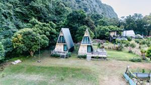 an aerial view of a small house in a field at The Pano Hup pa tat in Uthai Thani
