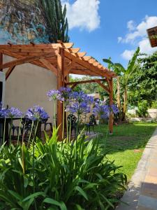 Κήπος έξω από το Loto Charming Art Residence VIII