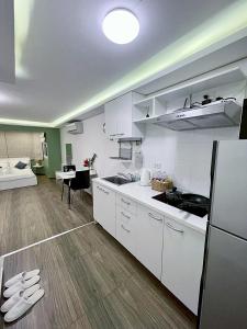 Η κουζίνα ή μικρή κουζίνα στο Cozy room at Hillside2 Condo