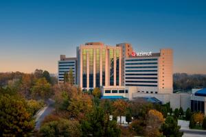 a large building with a samsung sign on it at AZIMUT Grand Hotel Tashkent in Tashkent