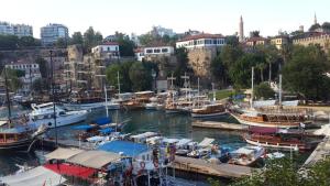 a bunch of boats docked in a harbor at Golden Lux Hotel Antalya in Antalya