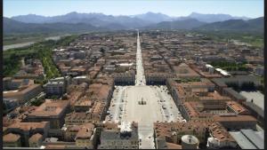 an aerial view of a city with a large obelisk at IO E TE bed and breakfast Appartamento in Cuneo