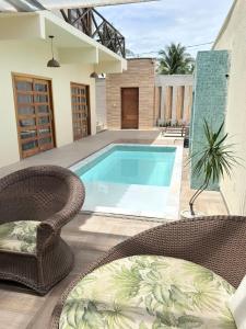 Bazén v ubytování Flow73 Flat - Praia de Acuípe nebo v jeho okolí