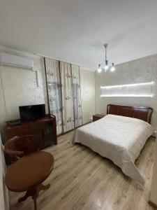 En eller flere senge i et værelse på Little Shangri-La