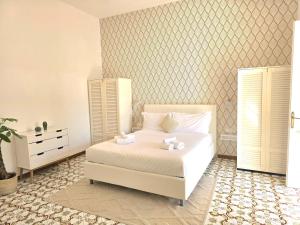 Ένα ή περισσότερα κρεβάτια σε δωμάτιο στο La terrazza