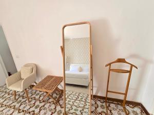 Ένα ή περισσότερα κρεβάτια σε δωμάτιο στο La terrazza +3 φωτογραφίες