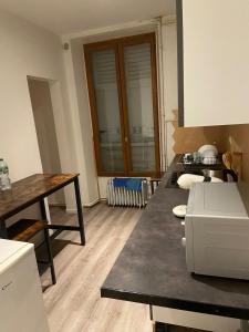 Una cama o camas en una habitación de Moderne et Comfortable Studio Proche RER