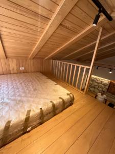 Ένα ή περισσότερα κρεβάτια σε δωμάτιο στο Planinska kuća