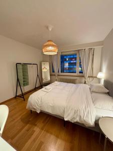 En eller flere senge i et værelse på Get Cozy