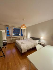 En eller flere senge i et værelse på Get Cozy