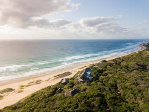 an aerial view of a beach and the ocean at Monarch Beach Villa in Cimbene