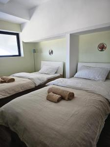 Postel nebo postele na pokoji v ubytování Soulnest Light