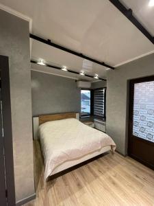 En eller flere senge i et værelse på Little Shangri-La