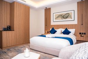 Ένα ή περισσότερα κρεβάτια σε δωμάτιο στο فندق ارجان بارك جدة