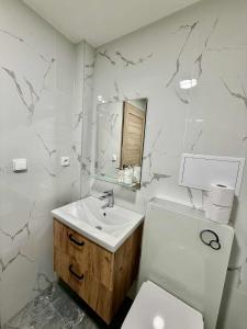 Ванная комната в Apartmány u náměstí +19 фотографий