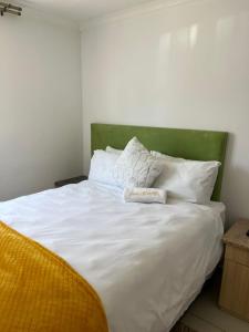 Postel nebo postele na pokoji v ubytování Suuka Guest House