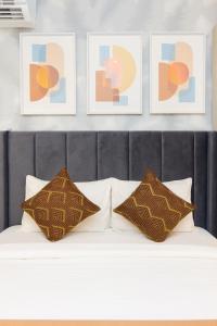 Postel nebo postele na pokoji v ubytování The Lennox by Sereni Athens + 13 fotografií