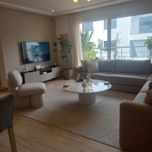 Posezení v ubytování Puerto Marina Dar Bouazza