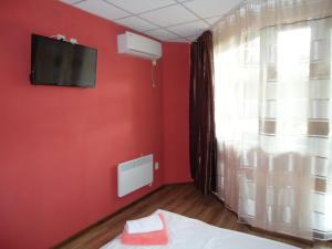 Et tv og/eller underholdning på Къща за гости Пиперите