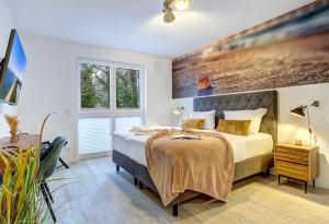 Ένα ή περισσότερα κρεβάτια σε δωμάτιο στο Bernsteinquartier BQ0556 Meeresgold