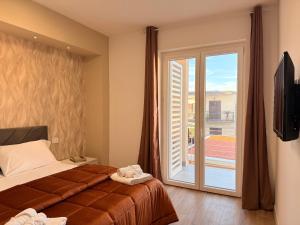 Giường trong phòng chung tại The Villas - Guest Houses