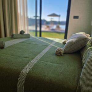 Una cama o camas en una habitación de Tempo B&B