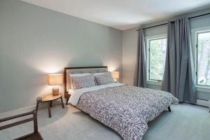 Postel nebo postele na pokoji v ubytování Tideview Estate