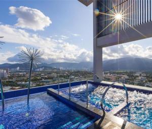 a swimming pool on top of a building at 22Macalisterz Georgetown Studio in George Town
