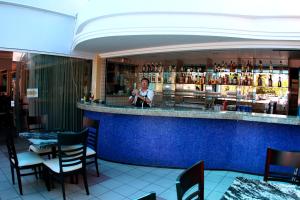 Loungen eller baren på Amuarama Hotel