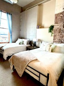 En eller flere senge i et værelse på The Bellevue in Canal Park